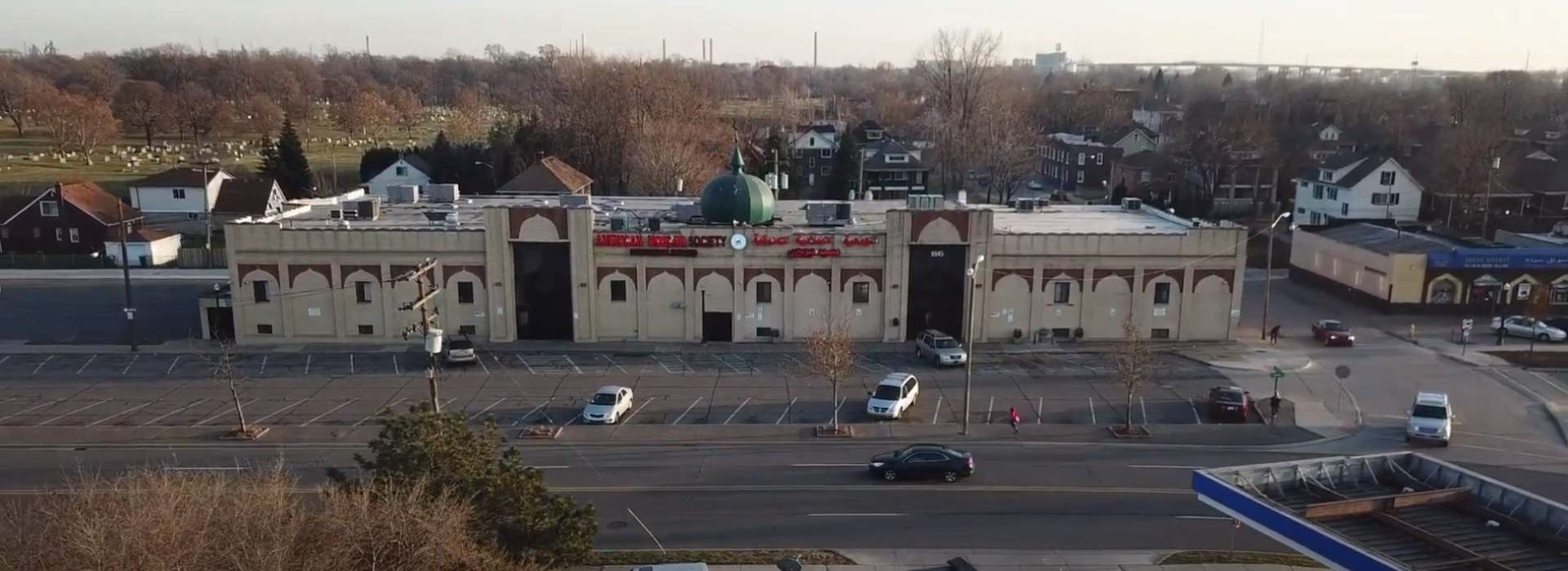 Aerial drone view of the American Moslem Society complex in the late 2010s, showing the full campus with its green dome before the 2019 rebrand