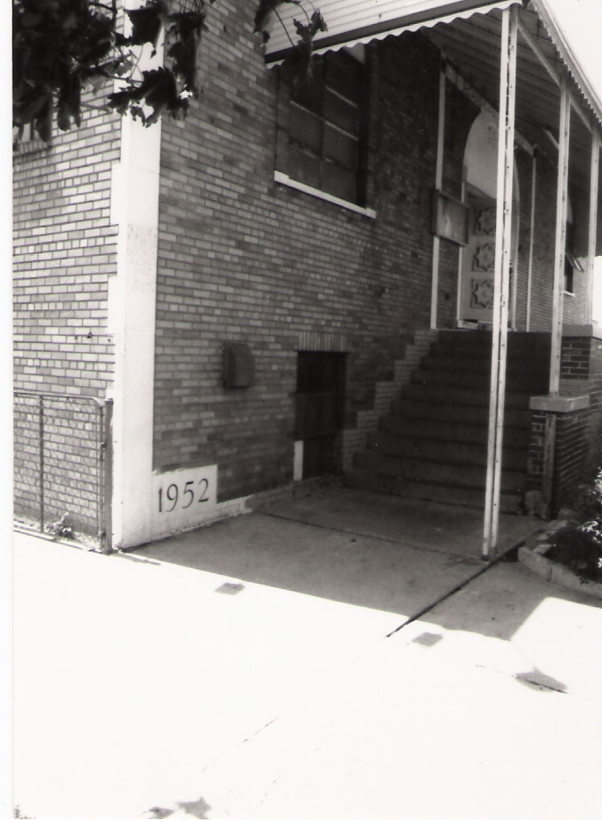 Entrance stairway to the AMS building with the year 1952 inscribed at the bottom of the steps