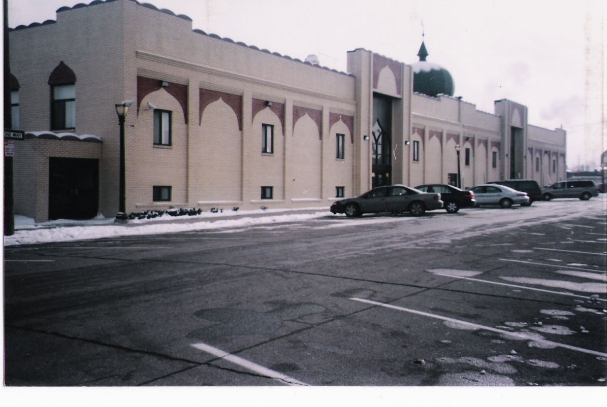 Exterior of the AMS after the final expansion in the early 2000s, showing the significantly enlarged building with its green dome
